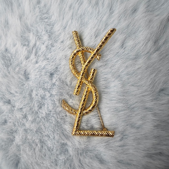 Yves Saint Laurent Jewelry - Yves Saint Laurent gold brooch for women